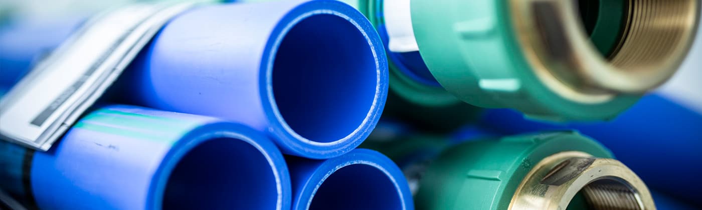Blue and green plastic pipes