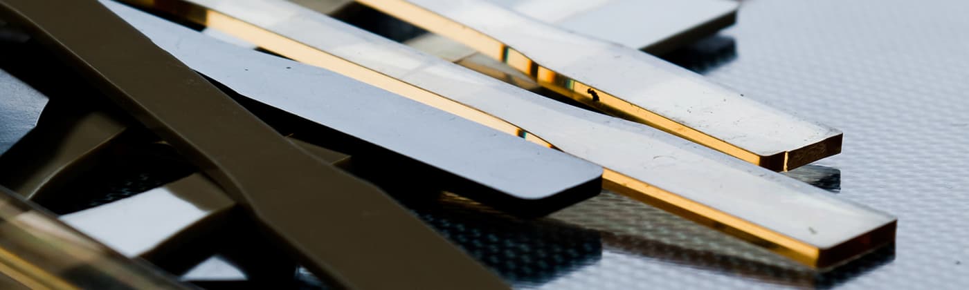 Black and yellow polymer testing coupon samples