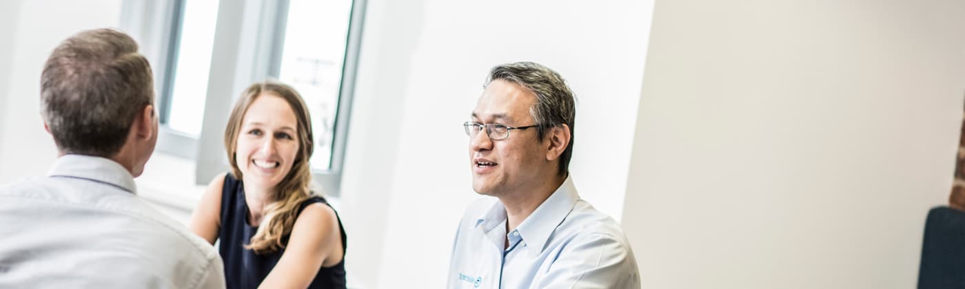 Element testing professionals collaborating on certification services and quality assurance protocols