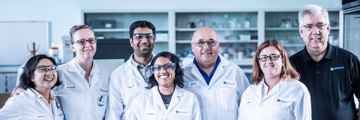 Element team of scientists and testing engineers in laboratory setting