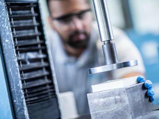 Technician Completing a compression test